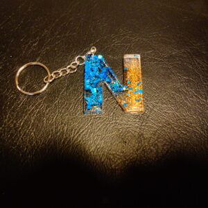LETTRE N PORTE CLEF PAILLETTES BLEU ET OR