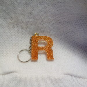 PORTE CLEF LETTRE R PAILLETTE CUIVRE