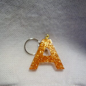 PORTE CLEF LETTRE A PAILLETTES CUIVRE
