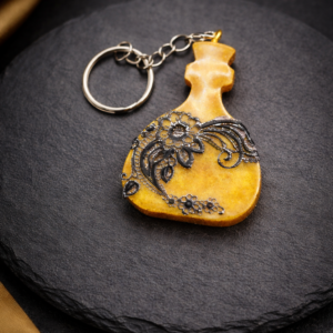 Porte-clefs bouteille jaune en résine